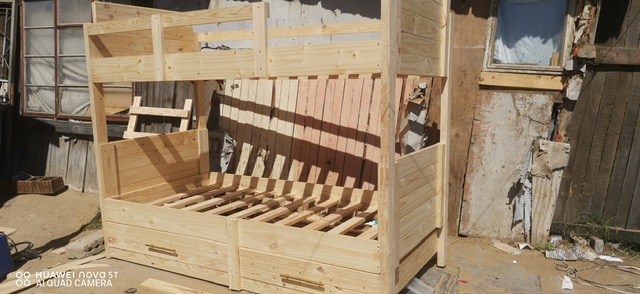 Craftsman working on wooden furniture